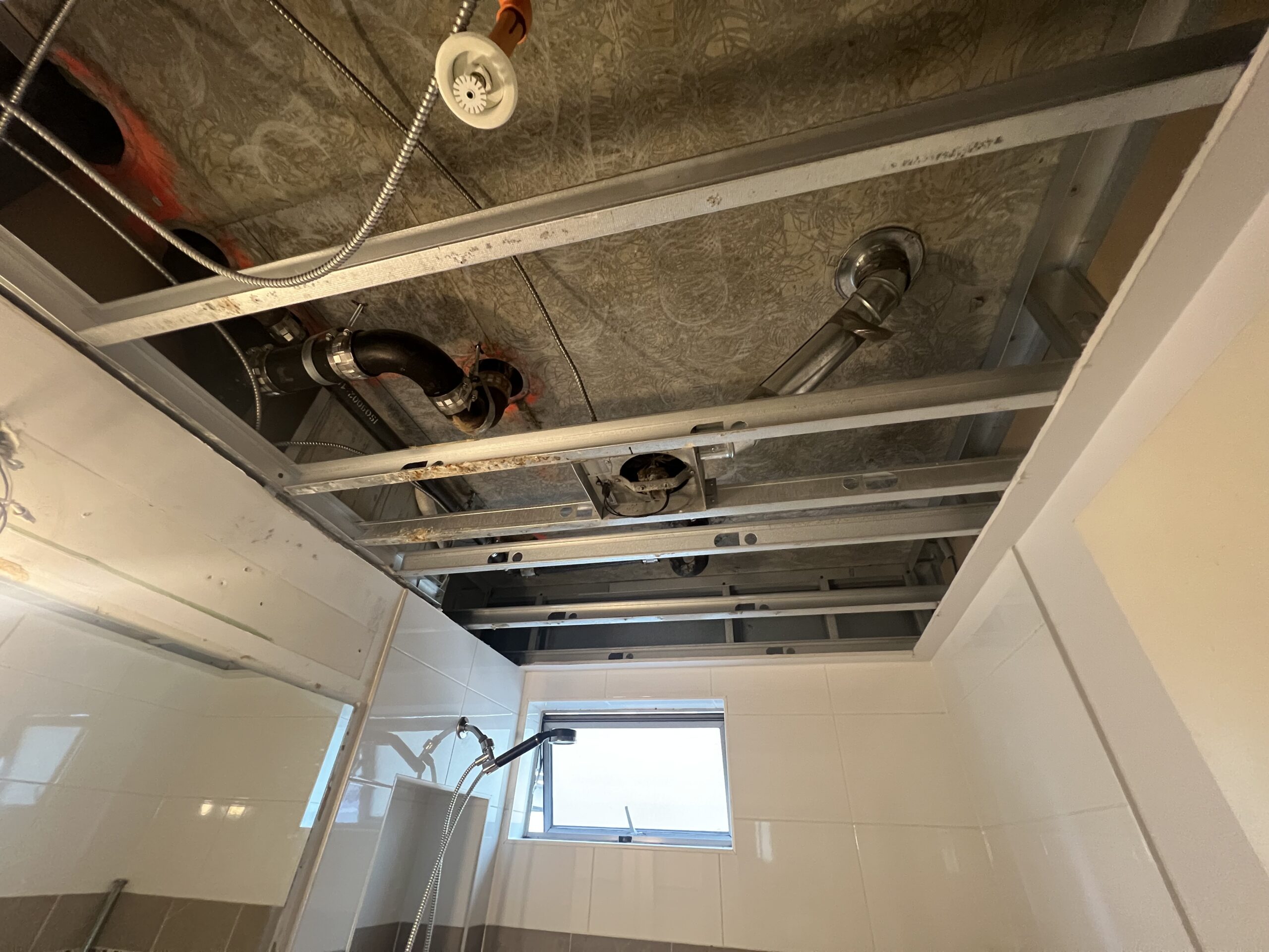 Vexa Paint & Renovate completed a bathroom ceiling drywall repair and painting project in Downtown Vancouver. Our team carefully repaired the damaged drywall, ensured proper surface preparation, and applied a smooth professional paint finish. The result was a clean, refreshed ceiling with a durable and polished appearance.